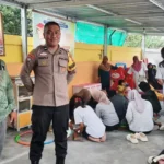 Bripka Reply di Taman Baca Napande di Kelurahan Baiya, Palu. (Foto: Humas Polresta Palu)