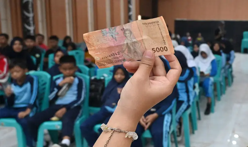 Literasi keuangan kepada para pelajar. (©bmzIMAGES/basri marzuki)